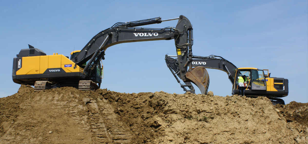 Excavator digging dirt